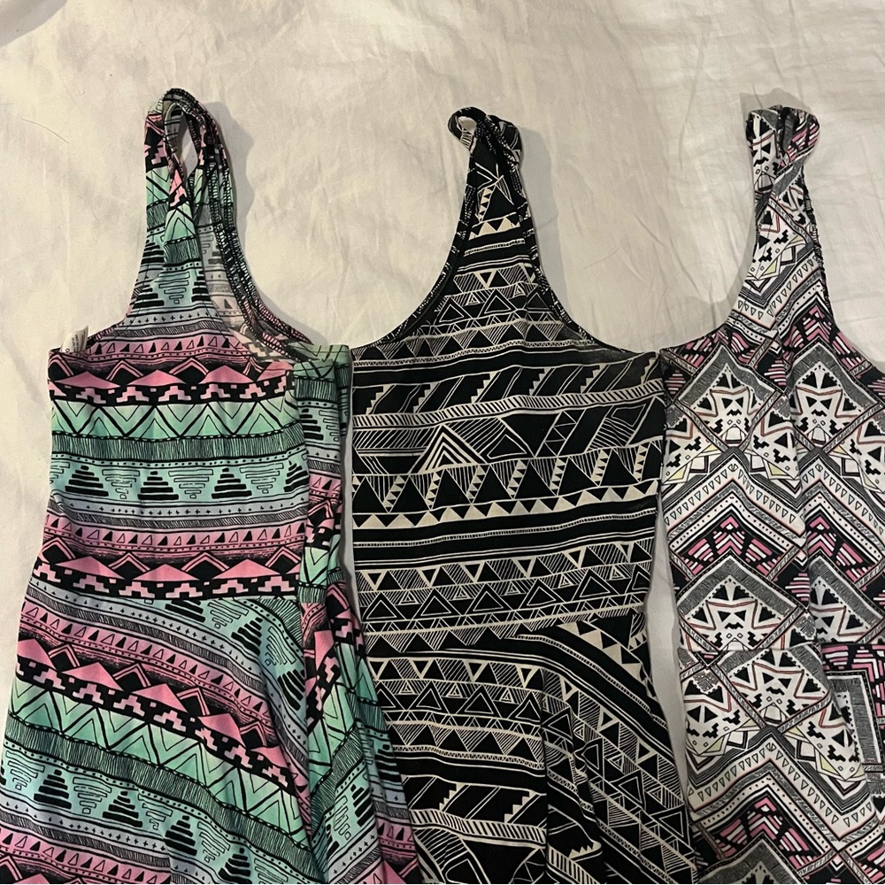 Three VS Pink geometric skater dresses in large